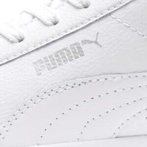 PUMA Women's Carina Leather Sneaker